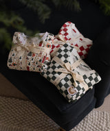 Christmas Baby Jersey Sleepsuit - Red Checkerboard