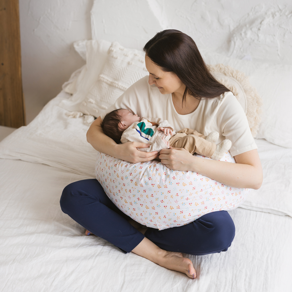 
                      
                        Nursing and Pregnancy Pillow in C-Shape With Organic Cover and Natural Kapok Filling in White
                      
                    